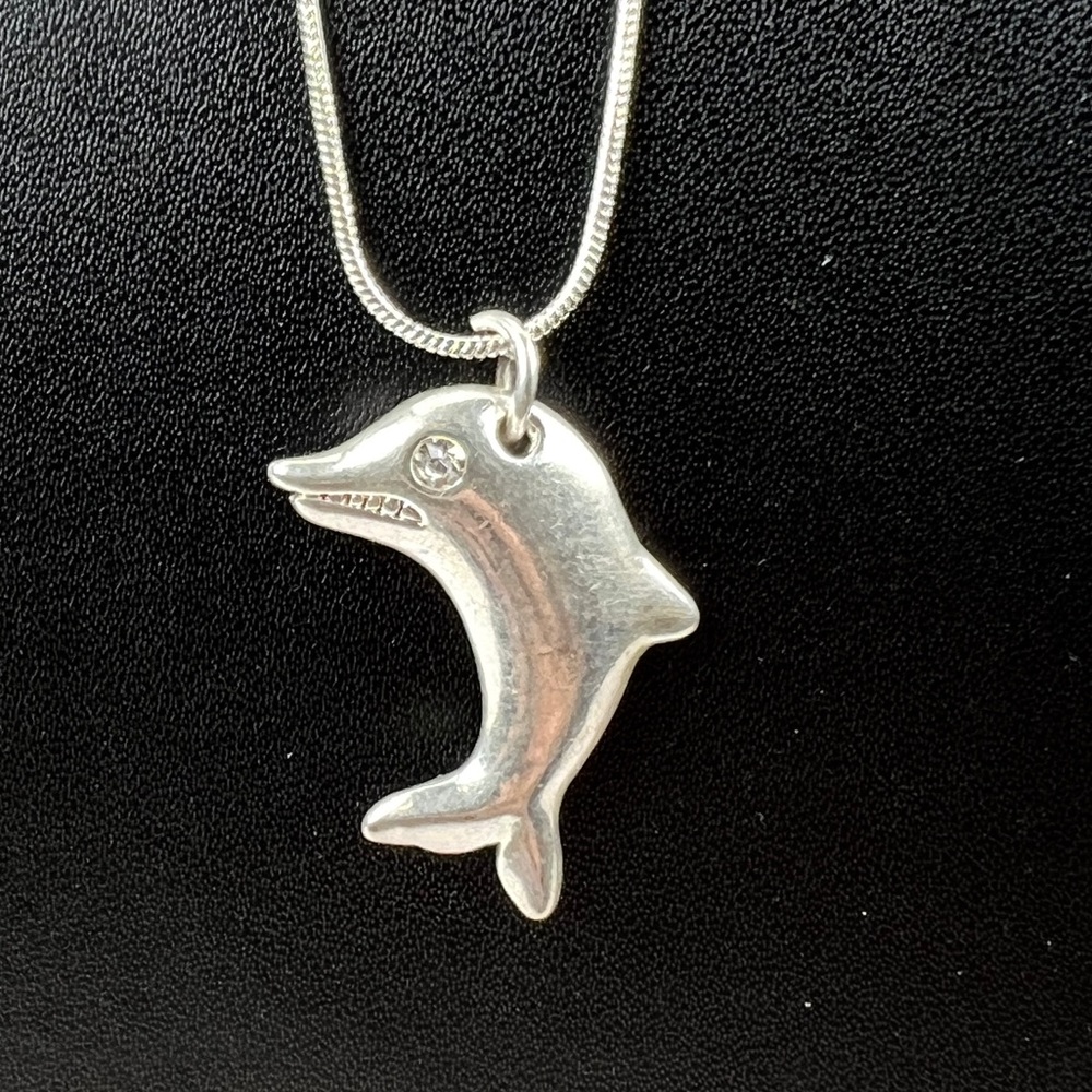 Beautiful, weighted, brushed, silvertone, dolphin pendant necklace